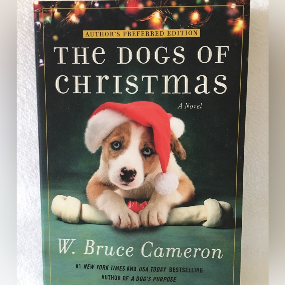 The Dogs of Christmas paperback Book. Like new.  Inscription shown in picture